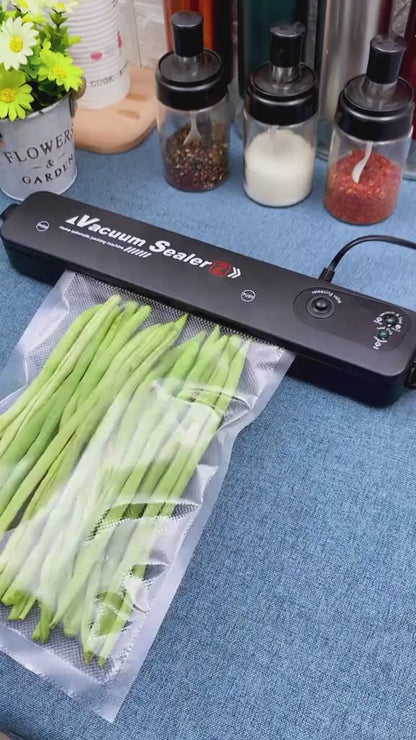 Vacuum Sealer Hand Machine ZKFK-001 - Automatic Food Sealer with 10 Vacuum Bags | Buy Online in Pakistan at MetroCart